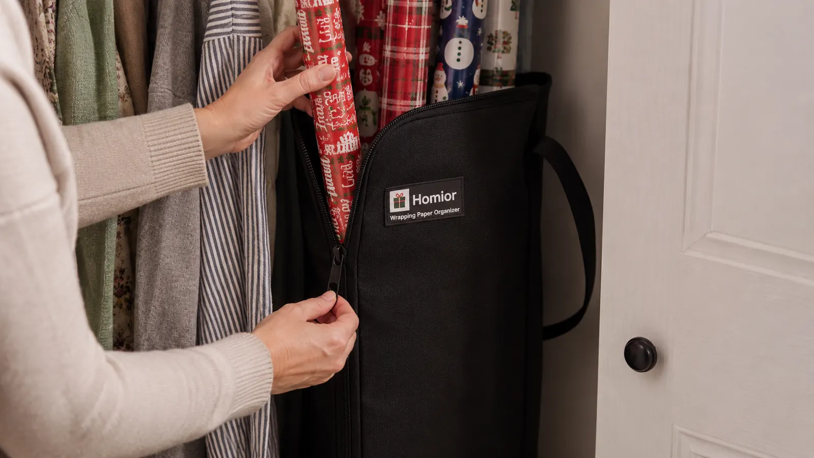 Woman unzipping a wrapping paper organizer to pull out a roll of gift wrap